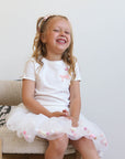 Skirt and T-shirt set with bow milk