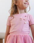 Set of skirt and T-shirt with a bow tea rose