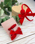 Headband with pompom balls and bow