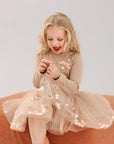 Beige skirt and long-sleeved top set with bow