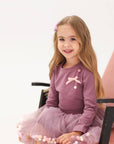 Skirt and long-sleeved set with plum bow