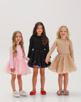 Set of skirt with balls and long sleeves in black