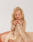 Beige skirt and long-sleeved top set with bow