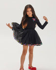 Set of skirt with balls and long sleeves in black