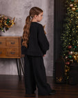 Suit with bows
