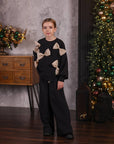Suit with bows