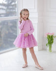 Set of skirt with balls and long sleeves in black