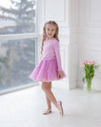 Set of skirt with balls and long sleeves in black