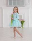 Set of skirt with balls and long sleeves in black