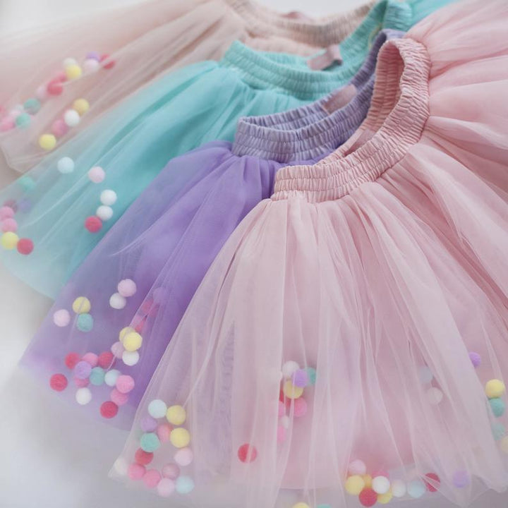 Спідниці з кульками-пумпонами - Little Lovelies - Одяг для маленьких модників